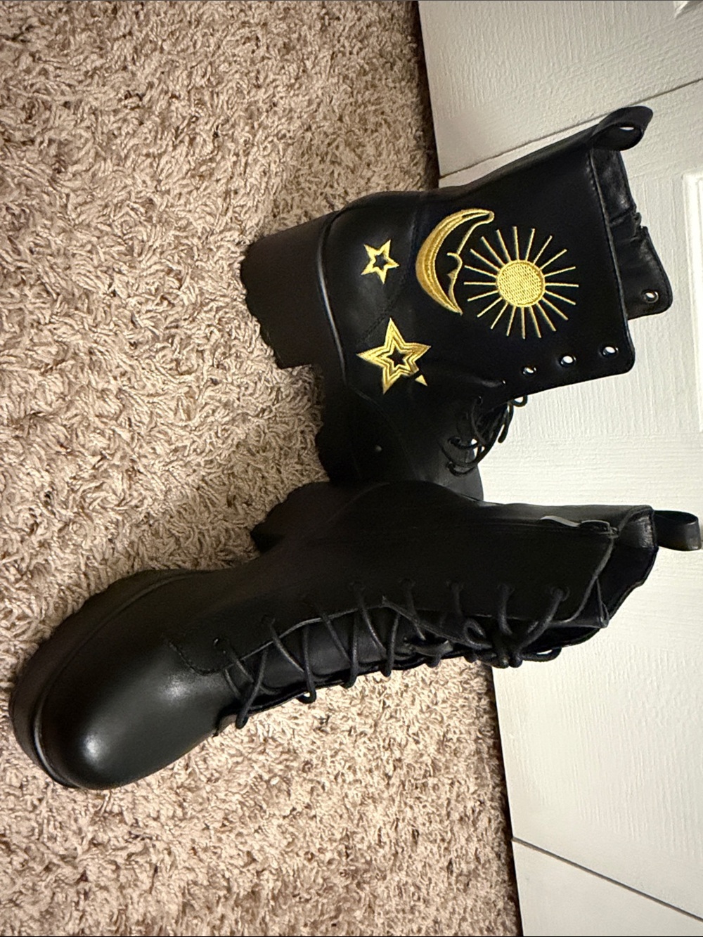 Gold moon and star accent boots.